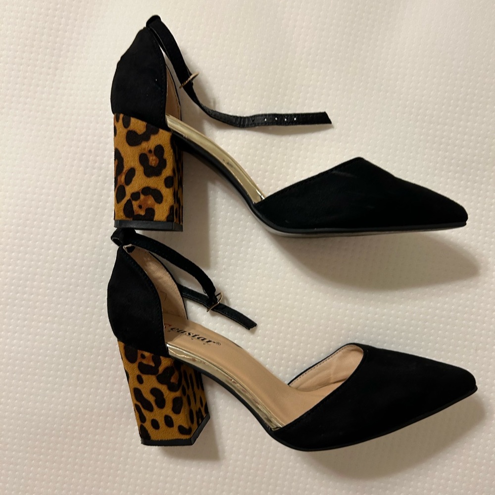 New heels size 9. Worn them only to try out in the store.